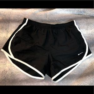 Black Nike running shorts